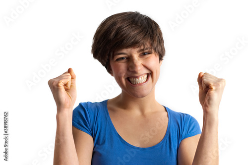 happy smiling young woman joy raised fist blue t-shirt photo