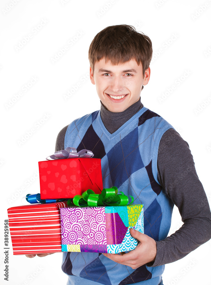 Present gift holding man looking camera isolated Present gift holding man looking camera isolated