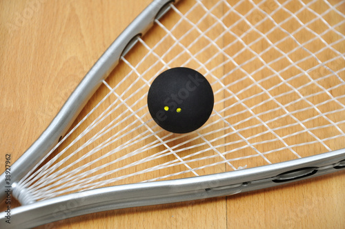 squash racket and ball photo