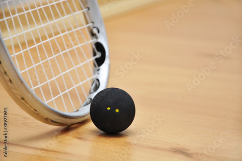 squash racket and ball photo