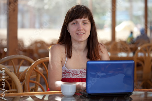 woman using   laptop at resort © JackF