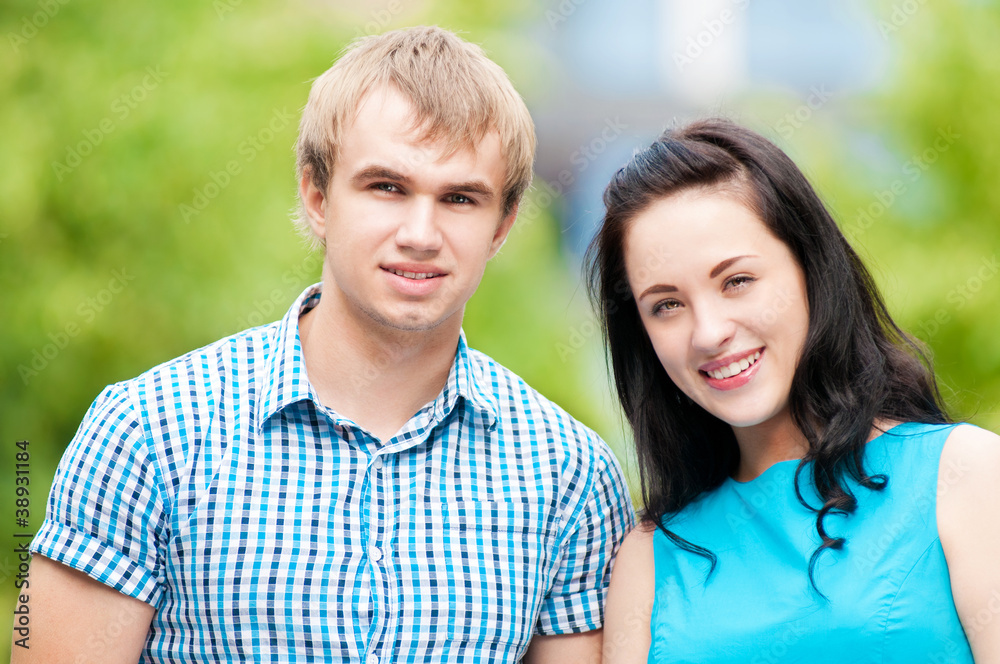 Portrait of a beautiful young happy couple