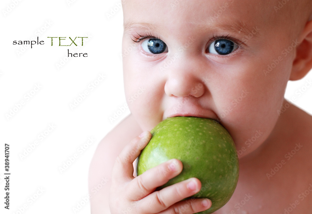 child holding a green apple child holding a green apple