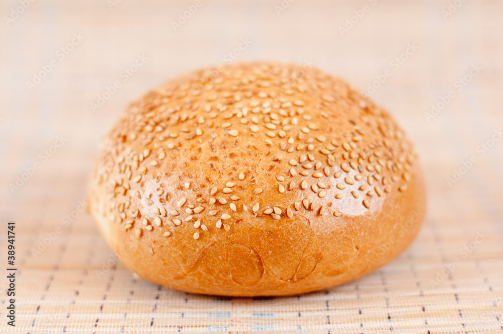 Appetizing bun with sesame seeds Appetizing bun with sesame seeds