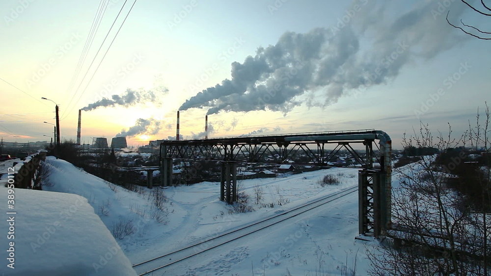 winter sunset with smoke pollution from termal station winter sunset with smoke pollution from termal station