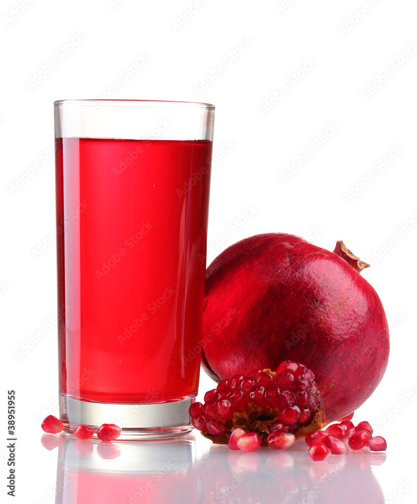 ripe pomergranate and glass of juice isolated on white. ripe pomergranate and glass of juice isolated on white.