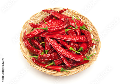chili peppers on the wicker dish