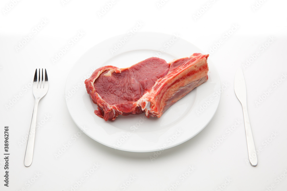 Place setting with fresh meat Place setting with fresh meat