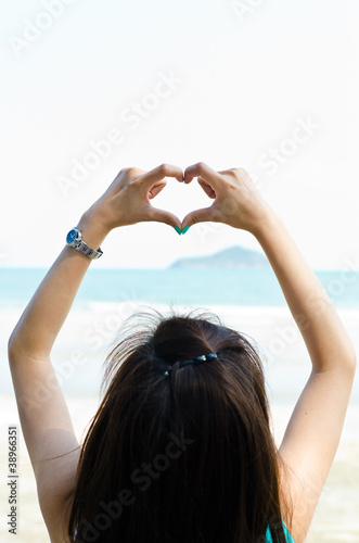 Hands make heart shape for love sign