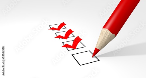 Red pencil makes a check in a check-box
