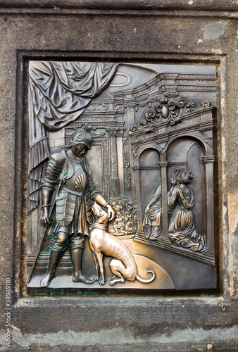 The bas-relief on the Charles Bridge in Prague photo