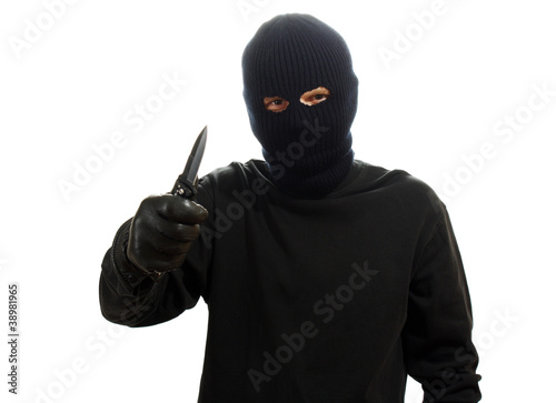 Bandit in black mask with knife isolated on white