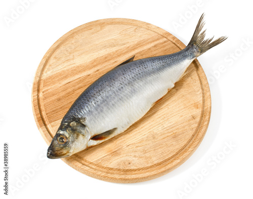 herring on wooden hardboard
