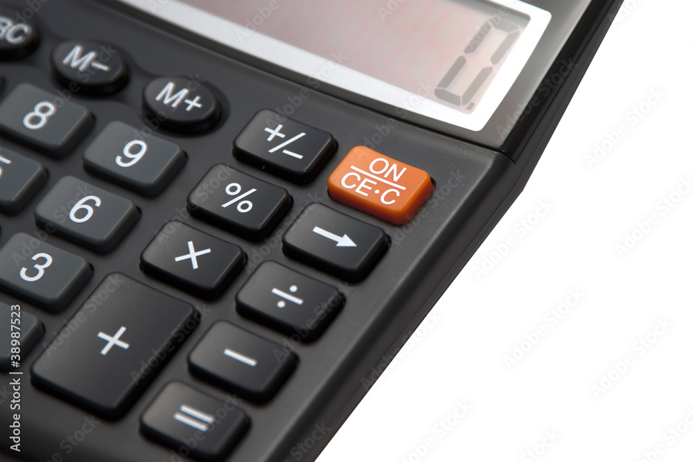 a calculator is located on a white background.. a calculator is located on a white background..