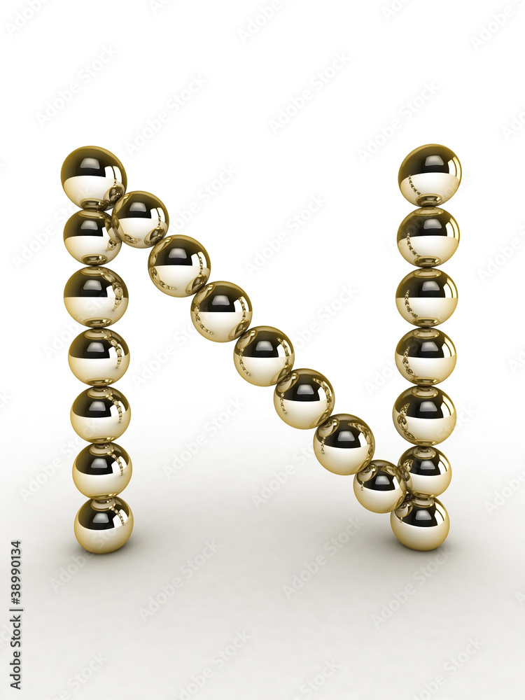 3d alphabet of gold beads. 3d alphabet of gold beads.
