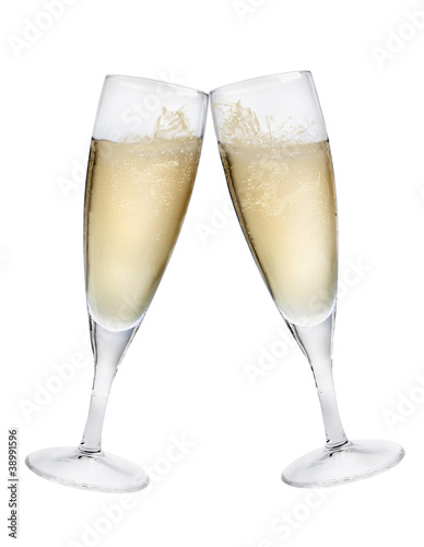 Champagne flutes making a toast isolated on white background