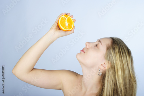 beautiful girl with citrus photo