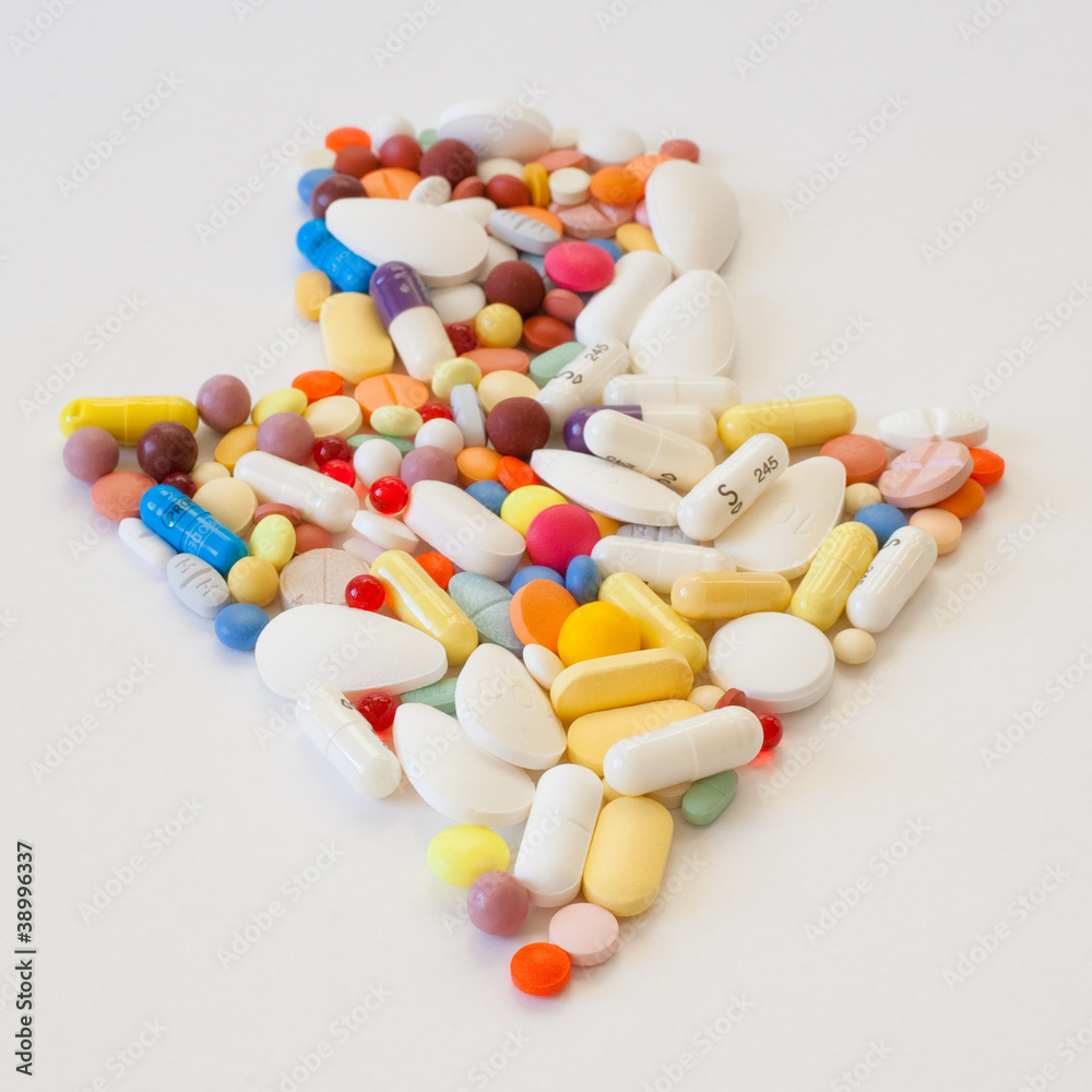Multi-colored pills on the table
