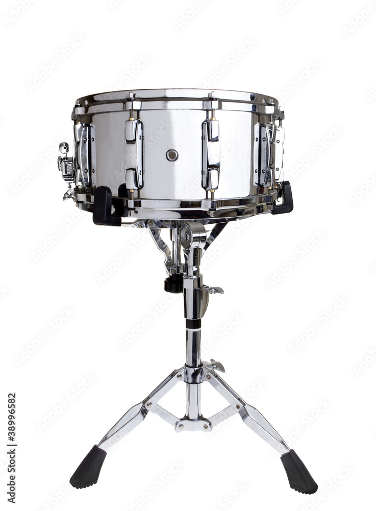 Big metal snare drum on a stand isolated on white