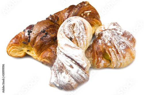 Fresh and tasty croissant on the white