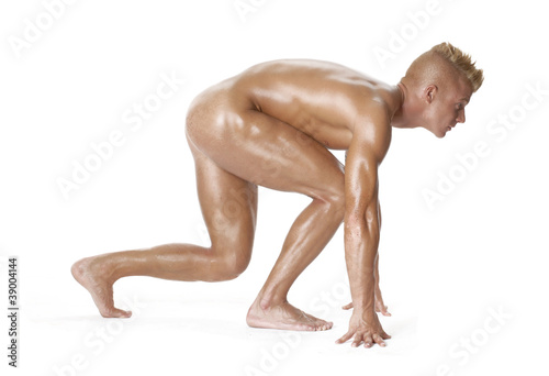 Hombre desnudo en partida de carrera. photo