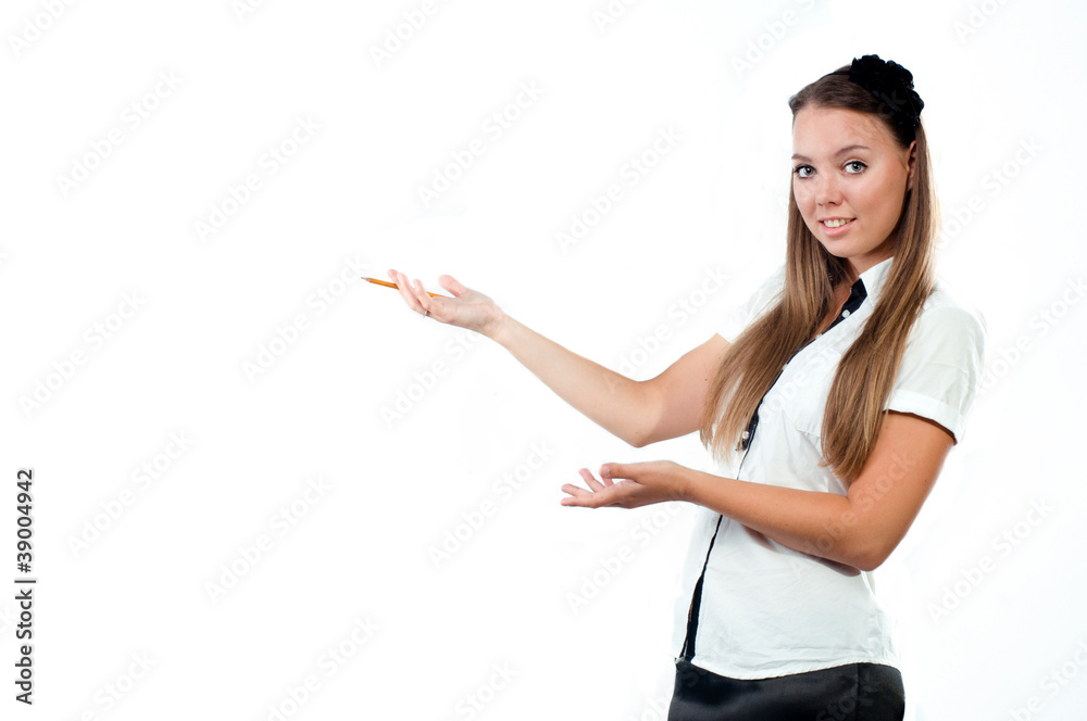 Beautiful young woman holding pencil and showing an empty space Beautiful young woman holding pencil and showing an empty space
