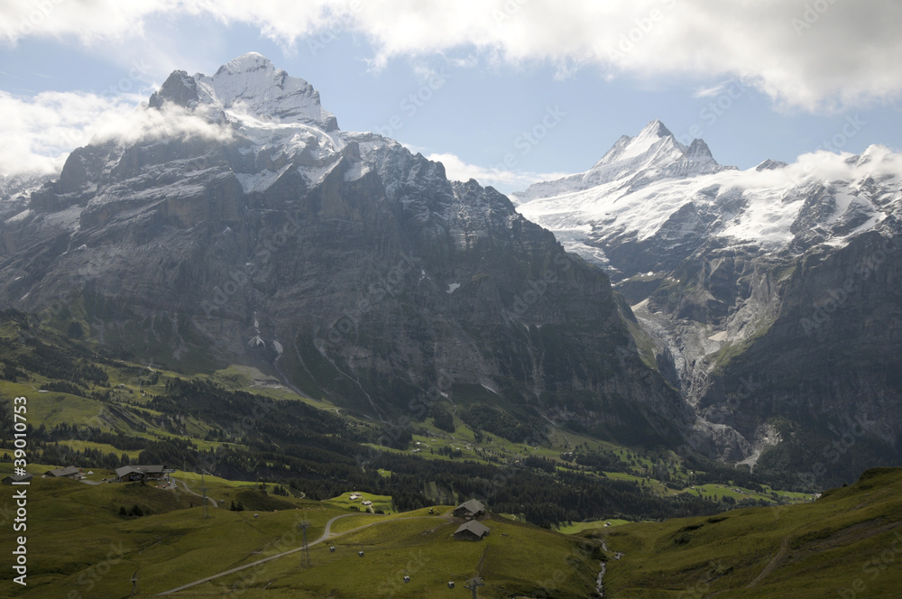 Huts and Schreckhorn above Grindelwald