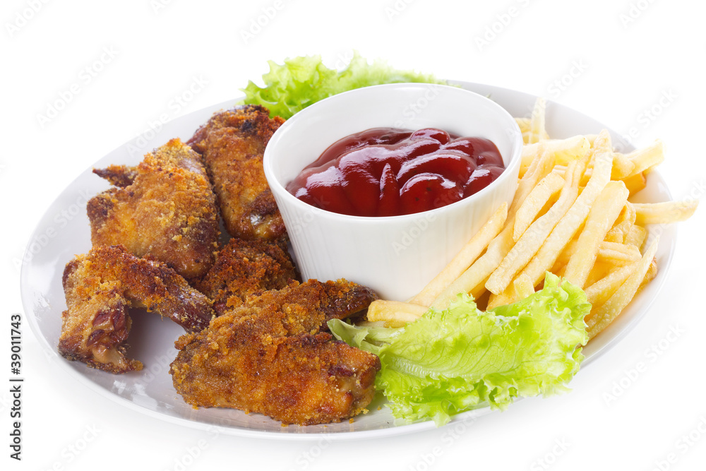 chicken wings with sauce and fries