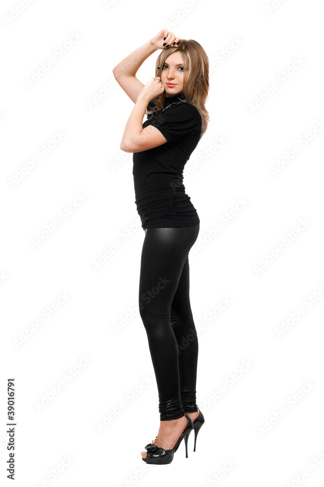 Attractive young woman in leggings. Isolated on white Attractive young woman in leggings. Isolated on white