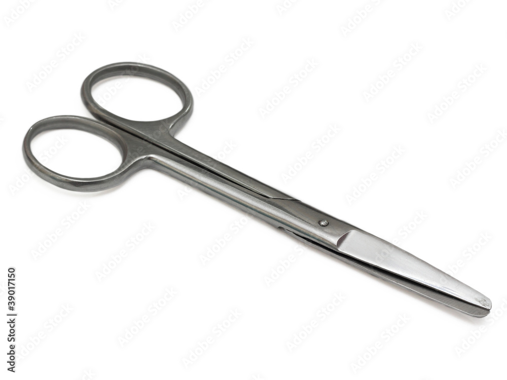 Metal medical shears on a white background Metal medical shears on a white background