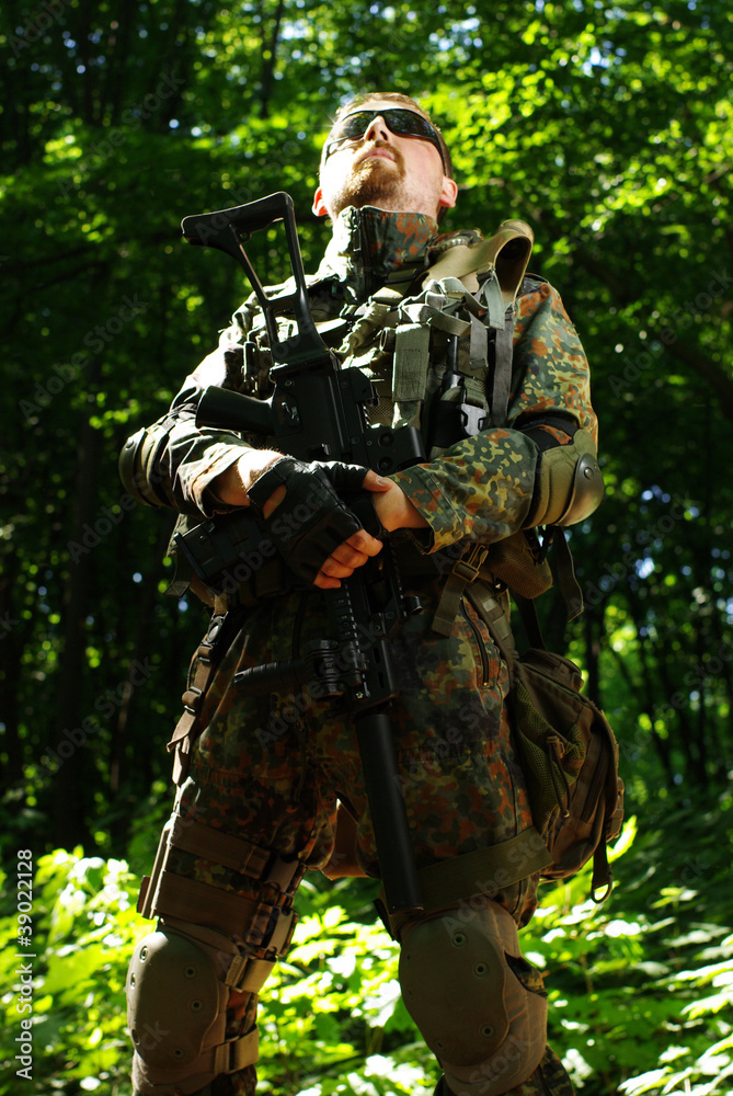 The soldier with automatic rifle