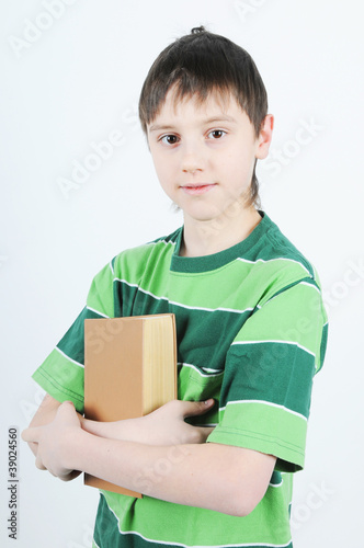 A boy holding a book