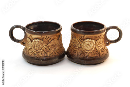 Two brown ceramic cofee cups