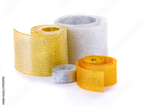 beautiful golden and silver ribbons isolated on white