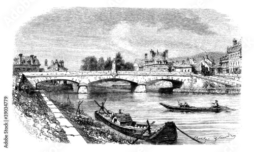 The Bridge of Clamecy (department of Nievre) and the bust of Jea photo