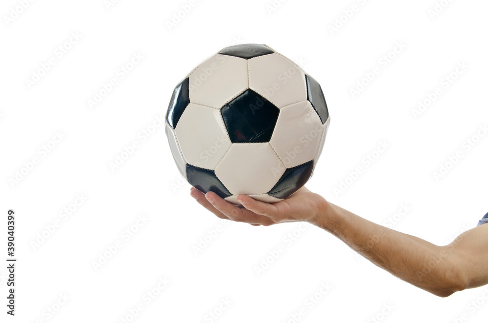 Businessman holding football on white