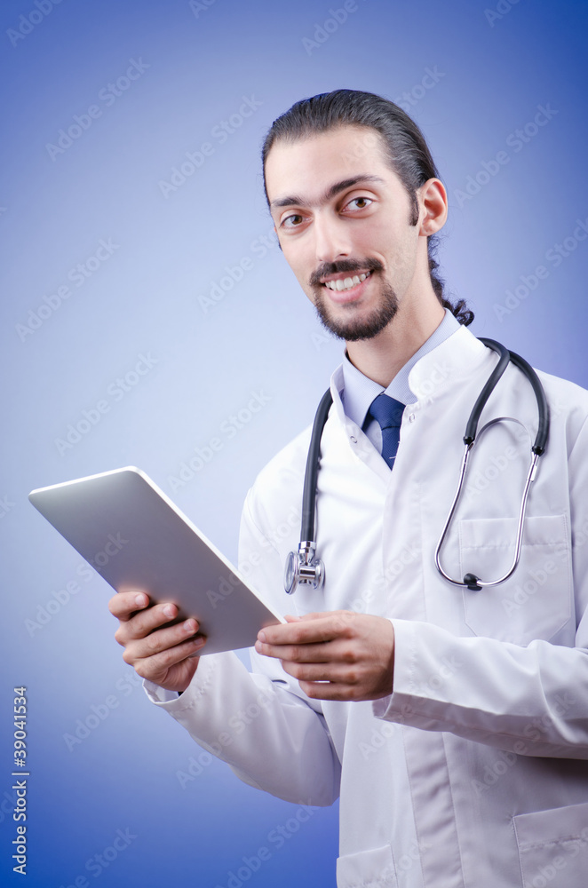 Doctor working on the tablet Doctor working on the tablet