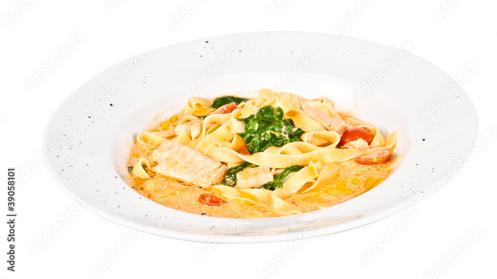 tasty pasta with cream, salmon, cheese and parsley close up tasty pasta with cream, salmon, cheese and parsley close up