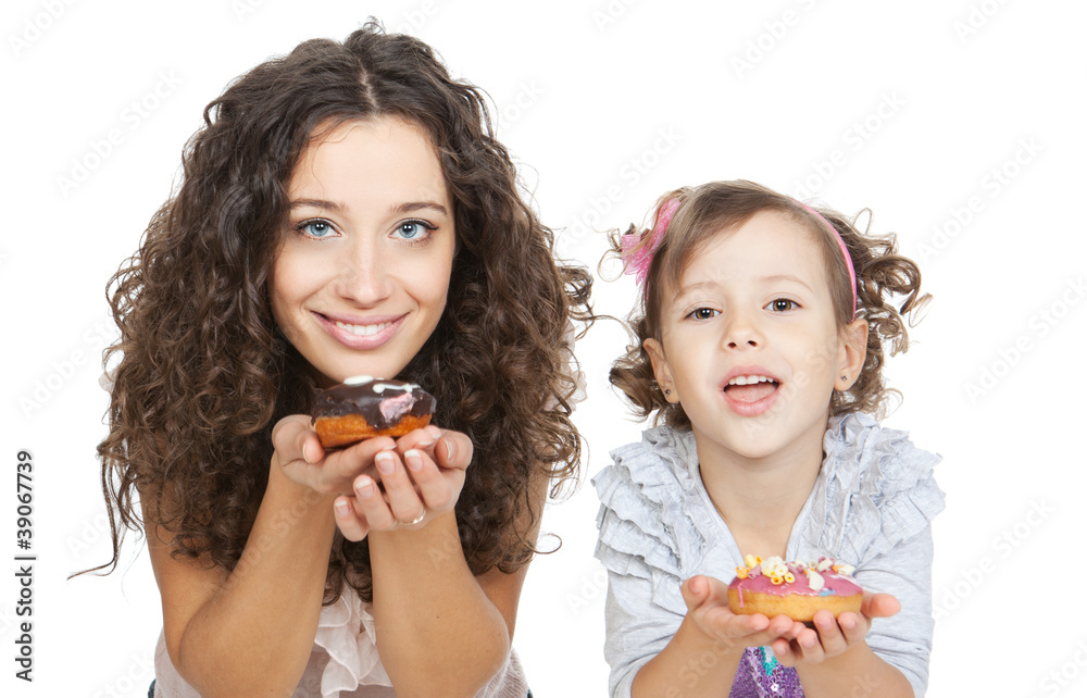 picture of happy mother and little girl with colorful donuts picture of happy mother and little girl with colorful donuts