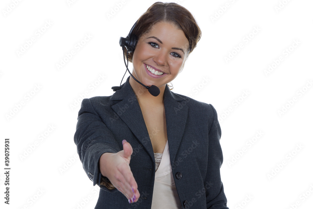 Lachende junge Frau mit Headset sagt Willkommen Lachende junge Frau mit Headset sagt Willkommen