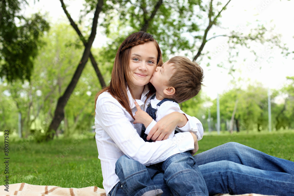 Fototapeta premium Mother with her son outside