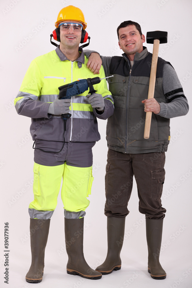 Building workers isolated on white background Building workers isolated on white background