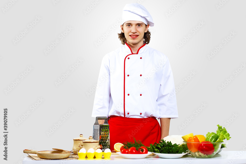 Portrait of a young cook in uniform