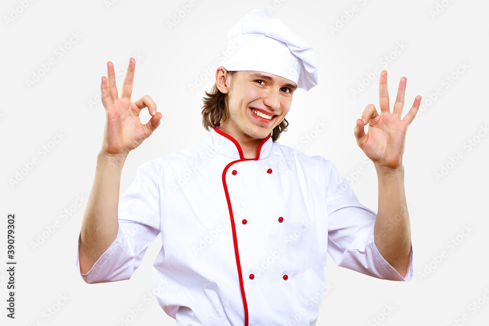 Portrait of a young cook in uniform Portrait of a young cook in uniform