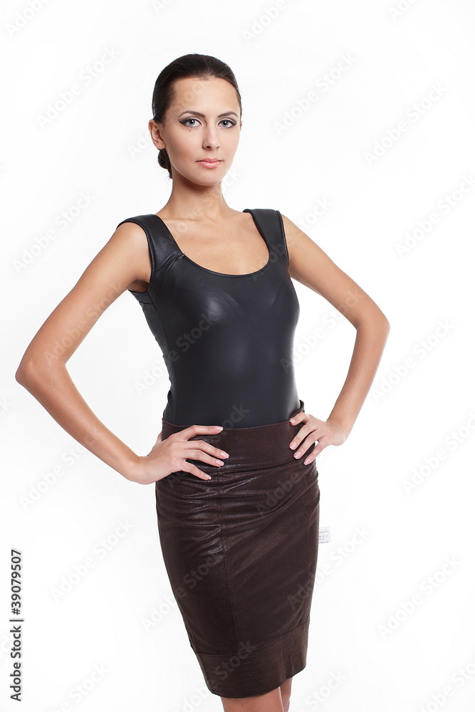 Young beautiful sexy woman in brown skirt Young beautiful sexy woman in brown skirt