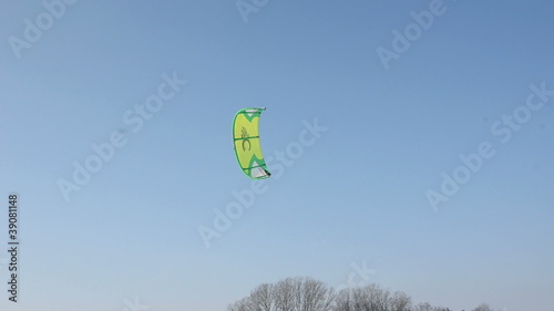 snow kiting on the winter lake ice photo