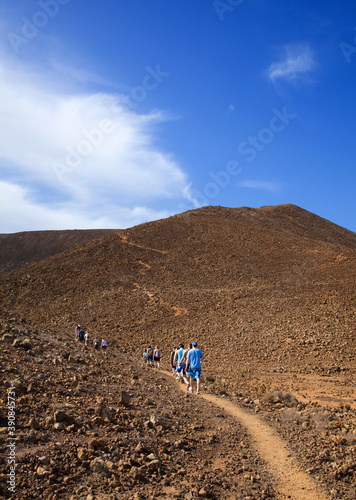Group of walkers on the path up Bayuyo volcano outside of Corral