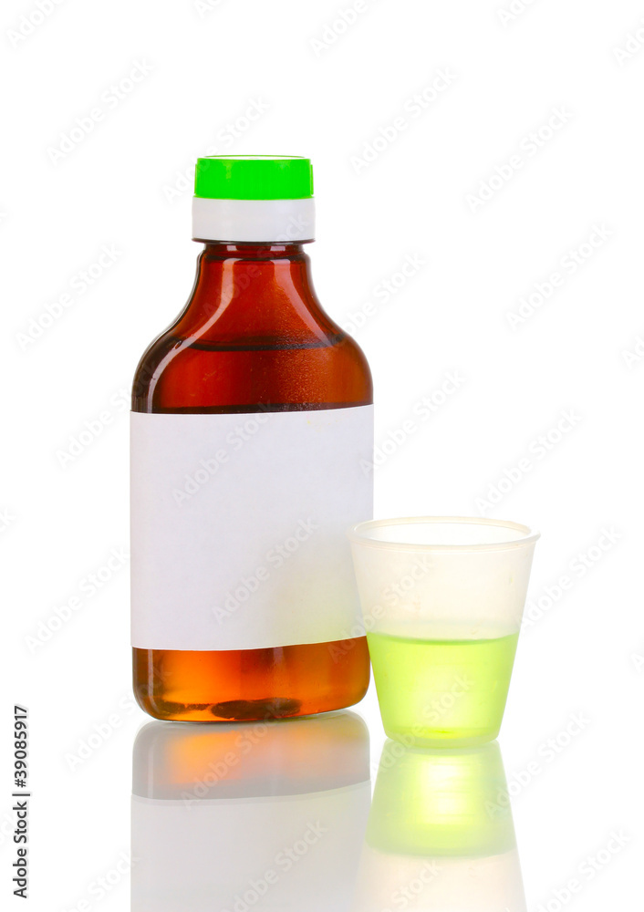 Medical bottle and jigger isolated on white Medical bottle and jigger isolated on white