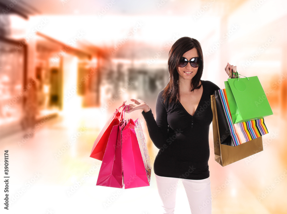 Shopping young woman in the shopping mall. Shopping young woman in the shopping mall.