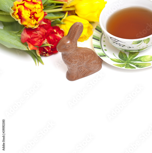 chocolate bunny, tea and flowers photo